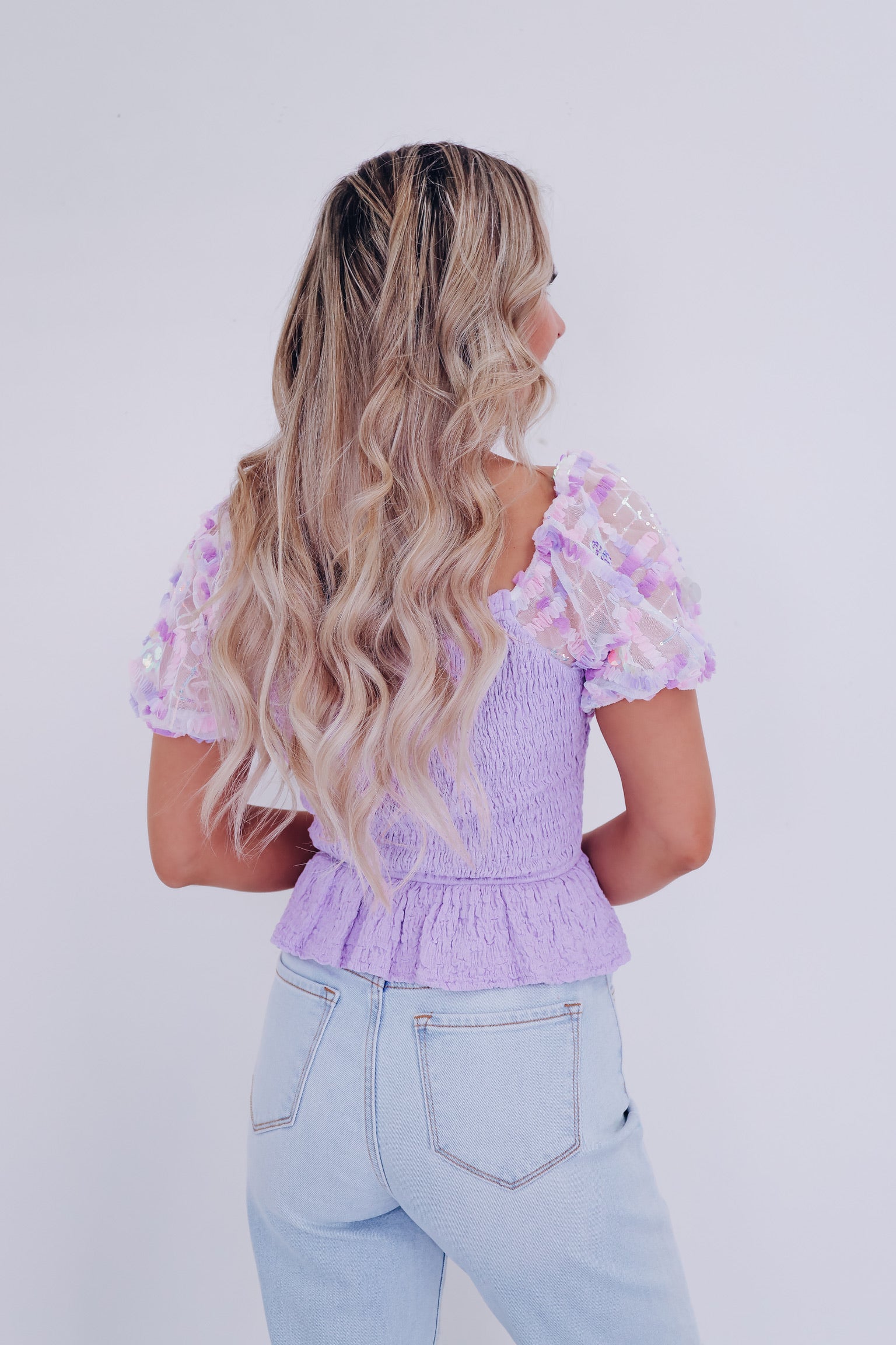 purple smocked top